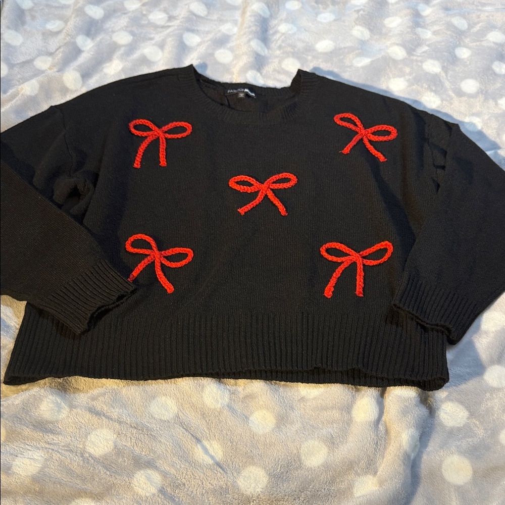Black Sweater with Red Bow Accents
